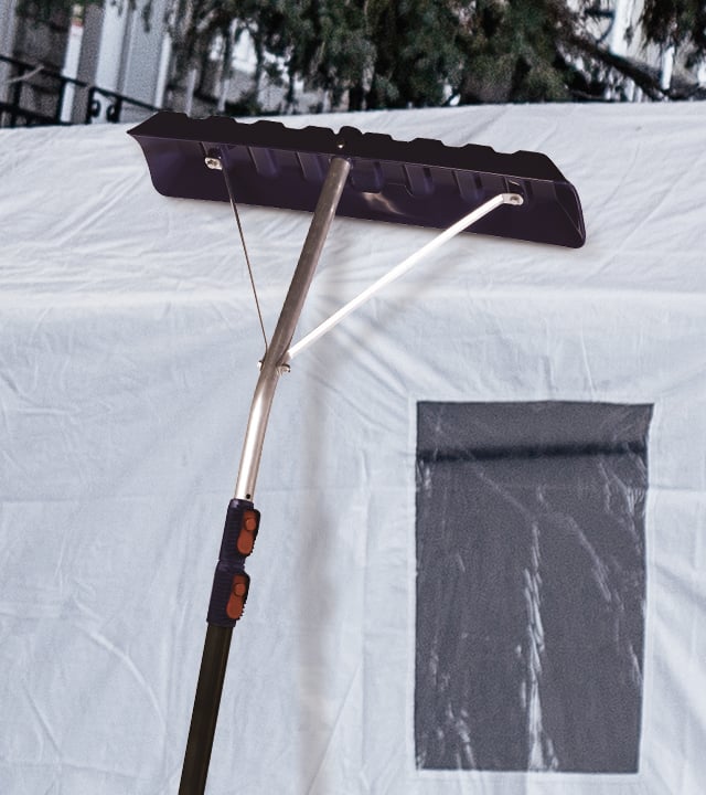 A cover scrapper that clears snow from a car shelter.