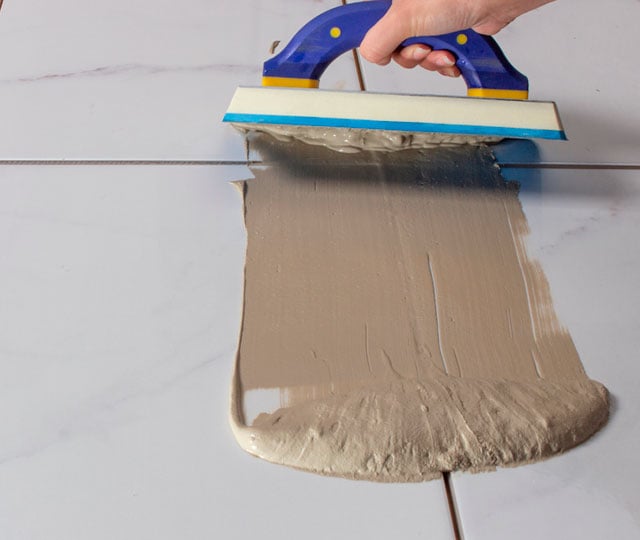 Finishing step when installing ceramic floor tiles