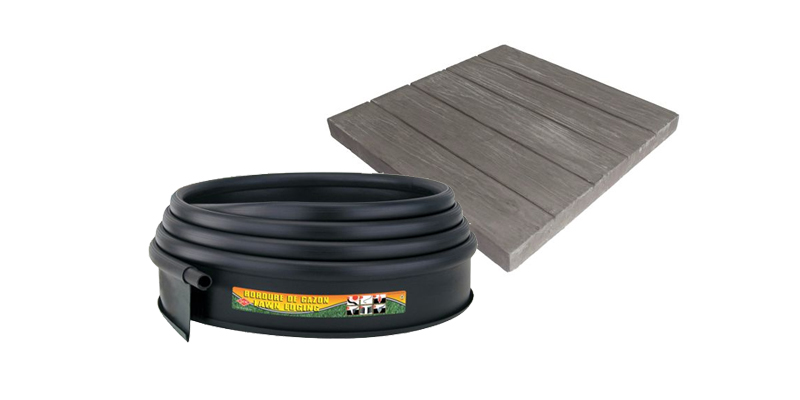 Flexible black plastic lawn edging and wood-look patio paver for landscaping projects.