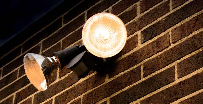 Safety lights on a brick wall